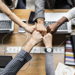 Colleagues giving a fist bump