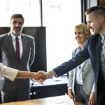 Business people shaking hands in a meeting room